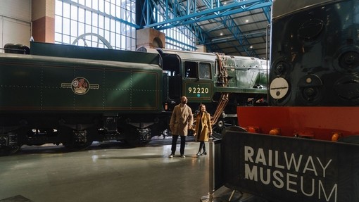 A man and a woman walking