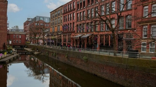 A view of shops running along a canal.
