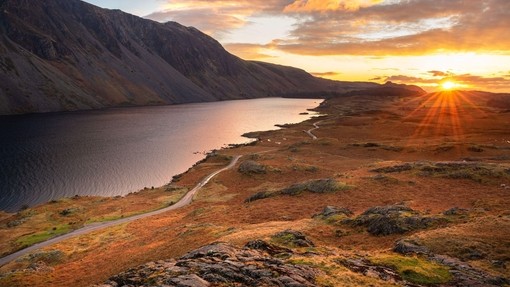 Aerial view of Wastwater lake with beautiful sunset clouds in sky. Lake District, England.
