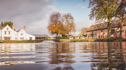 Overlooking the lake in front of the buildings of