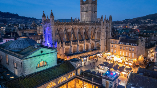 A cathedral, a market and a historic spa lit up at night