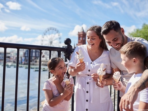 Family enjoying ice cream at Cardiff Bay