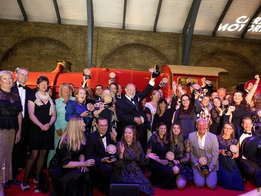 Group shot of Gold Award winners at VisitEngland Awards for Excellence 2023.