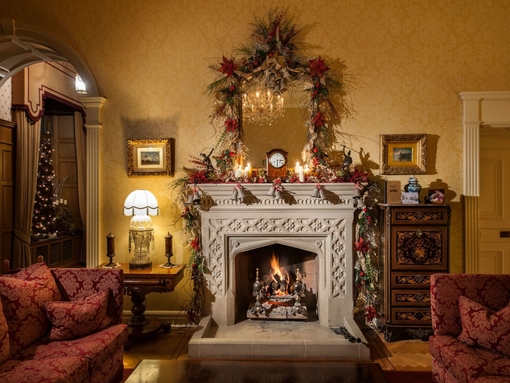 Christmas tree and decorations in the drawing room of a luxury hotel.