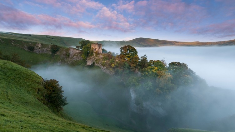 Peveril Castle on a beautiful misty morning in Autumn