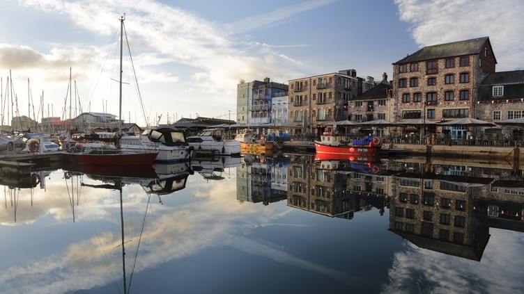Harbour with boats and shops and cafe's at Plymouth Barbican