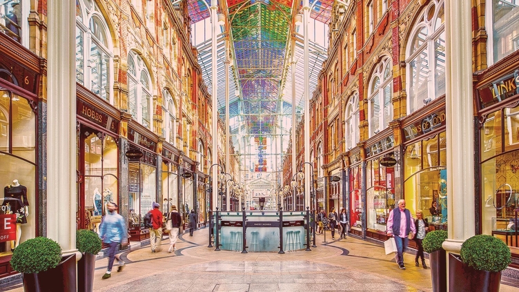 A view down a shopping street in Leeds' historic Victoria Quarter