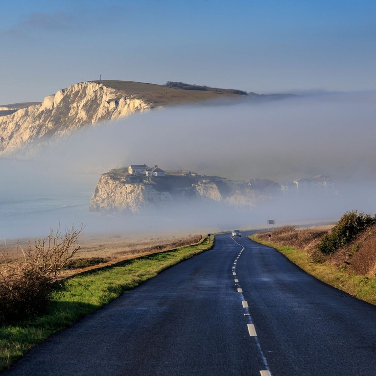 Freshwater Bay on the Isle of Wight with atmospheric coastal fog