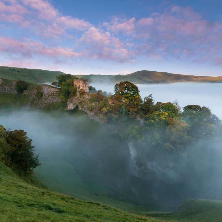 Peveril Castle on a beautiful misty morning in Autumn