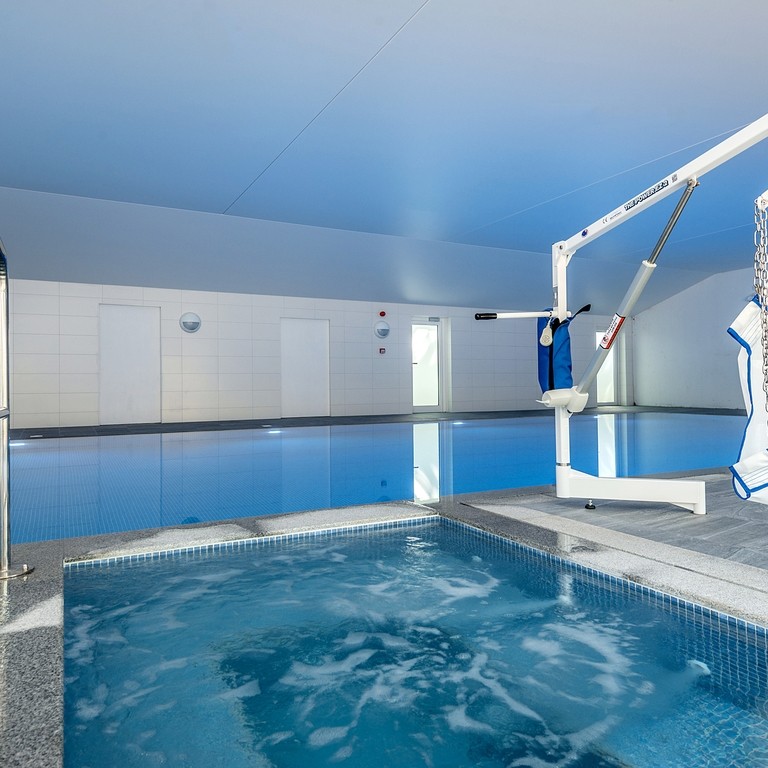 33. Wallops Wood Cottages pool hoist and jacuzzi