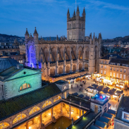 A cathedral, a market and a historic spa lit up at night