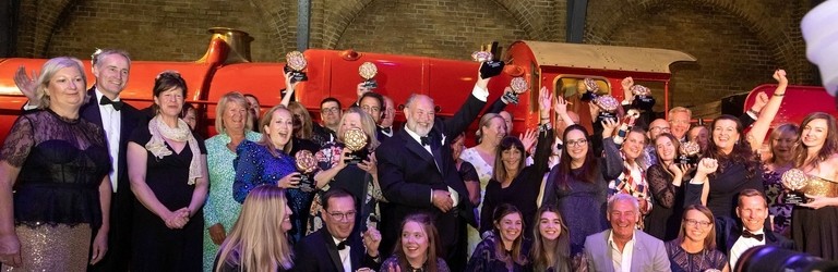 Group shot of Gold Award winners at VisitEngland Awards for Excellence 2023.