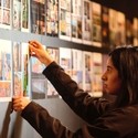 Woman arranging display in a museum
