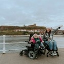 Jennie and Gem, two wheelchair users, on Whitby Pier.