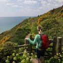 Woman hiking on coastal path 